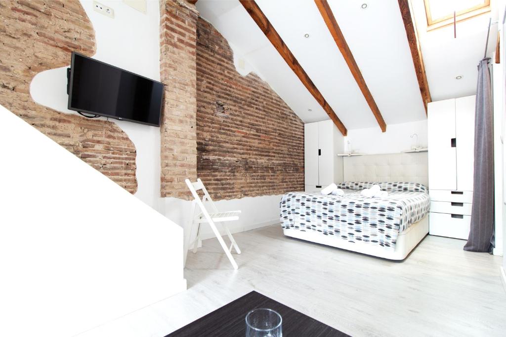 Krevet ili kreveti u jedinici u okviru objekta Precioso estudio con terraza privada en la playa
