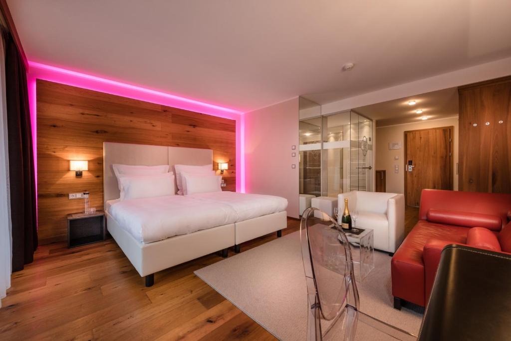 Posteľ alebo postele v izbe v ubytovaní Alpinresort ValSaa - Sport & Spa