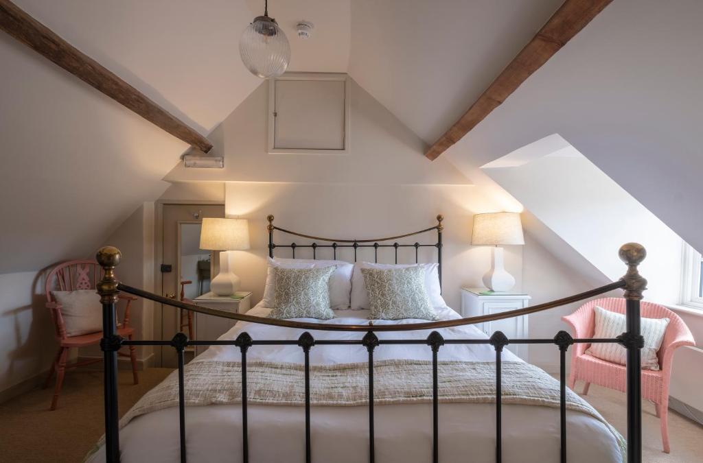 a bedroom with a bed in a attic at The Ship At Dunwich in Dunwich