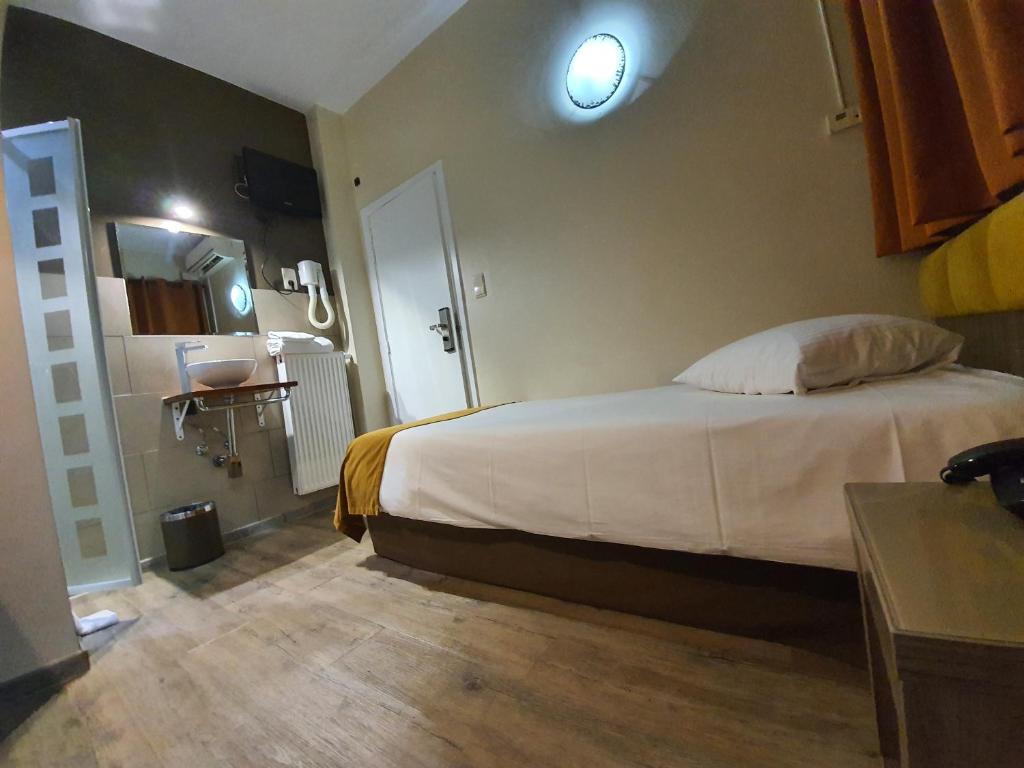 Postel nebo postele na pokoji v ubytování Hotel Midi-Zuid