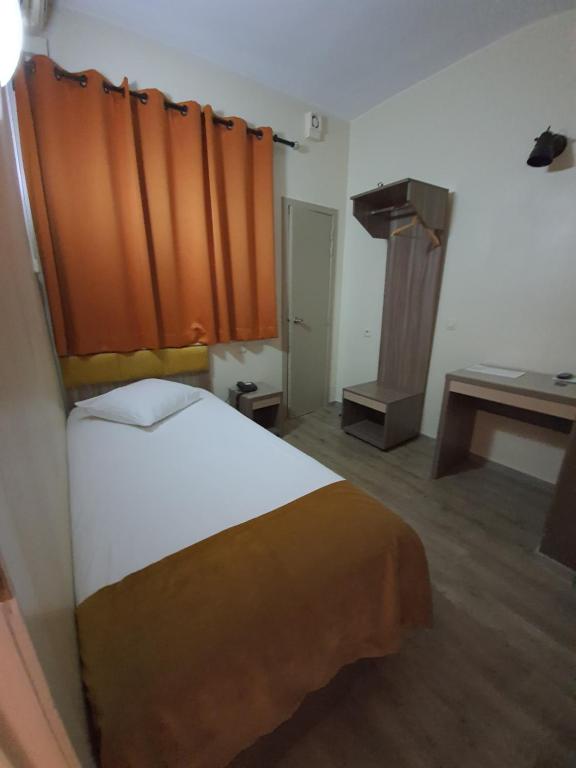 Postel nebo postele na pokoji v ubytování Hotel Midi-Zuid