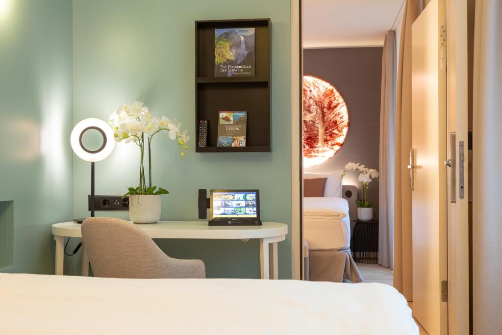 Postel nebo postele na pokoji v ubytování Cascada Boutique Hotel