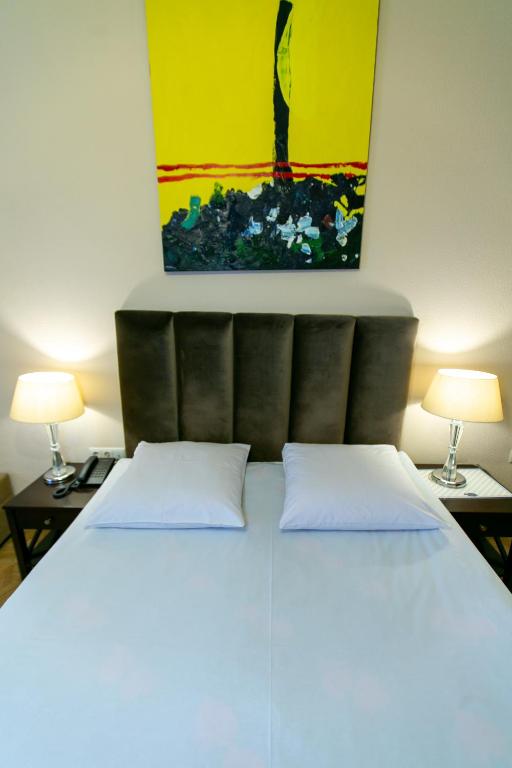 Postel nebo postele na pokoji v ubytování Hotel VIP
