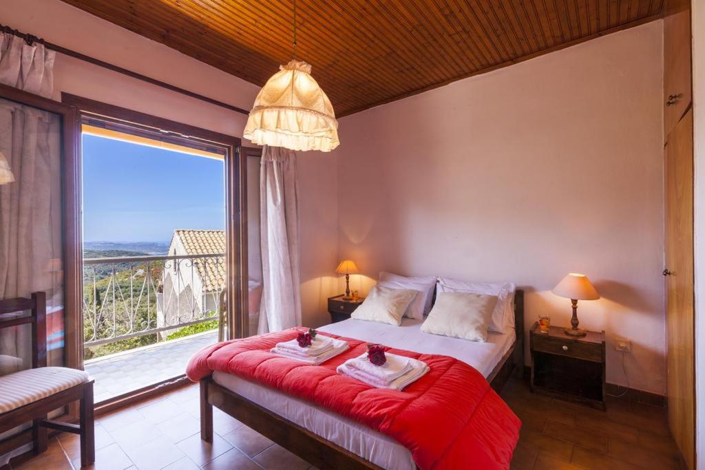 Postel nebo postele na pokoji v ubytování ARETOUSA APARTMENT