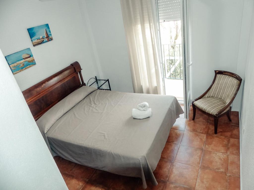 Postel nebo postele na pokoji v ubytování Faro II Holiday Home