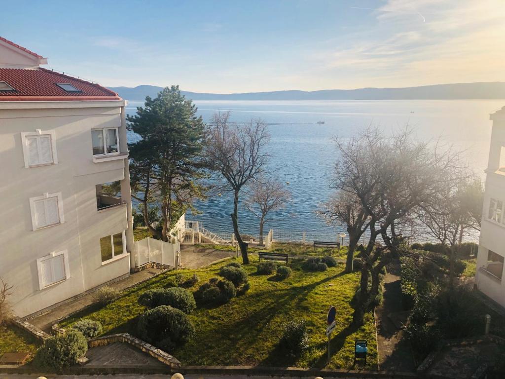 a building with a view of the water at Apartment Svetlana in Selce