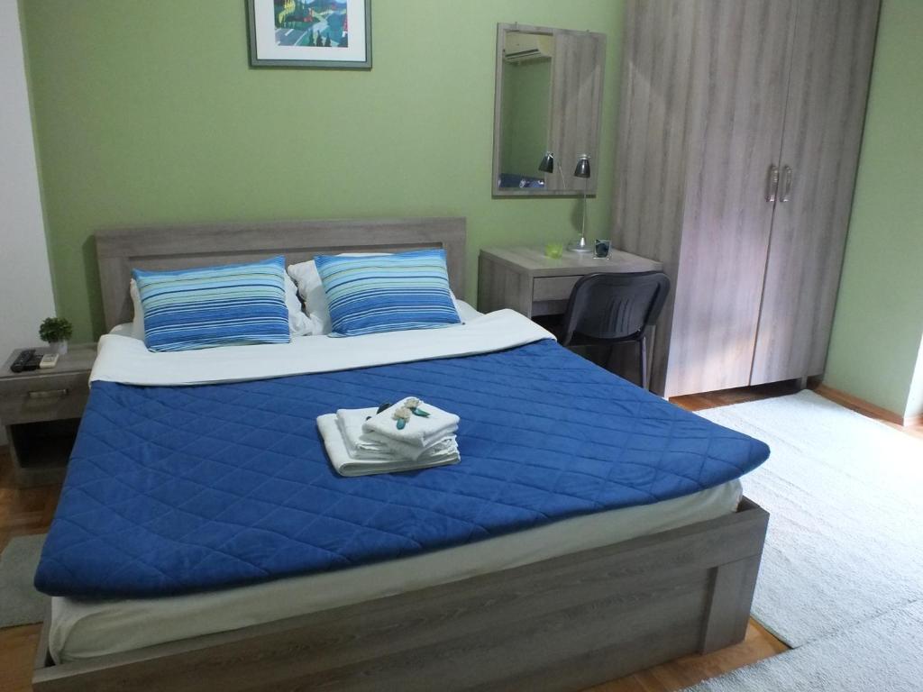 Postel nebo postele na pokoji v ubytování Apartment Temple