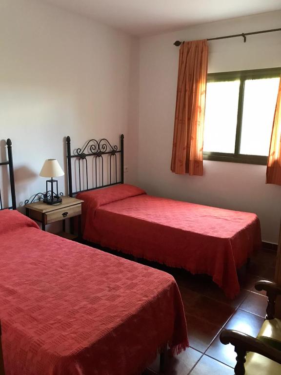 Posteľ alebo postele v izbe v ubytovaní Casa Los Pérez