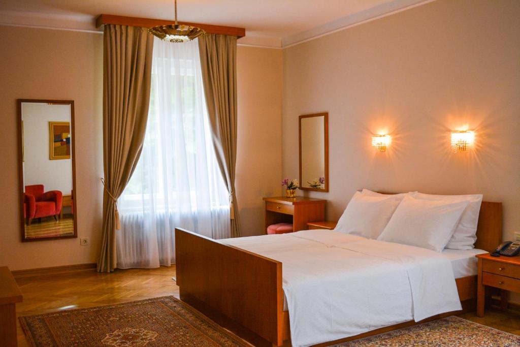 Postel nebo postele na pokoji v ubytování Vila Bled