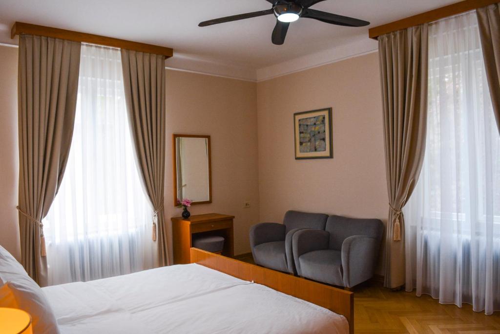 Postel nebo postele na pokoji v ubytování Vila Bled