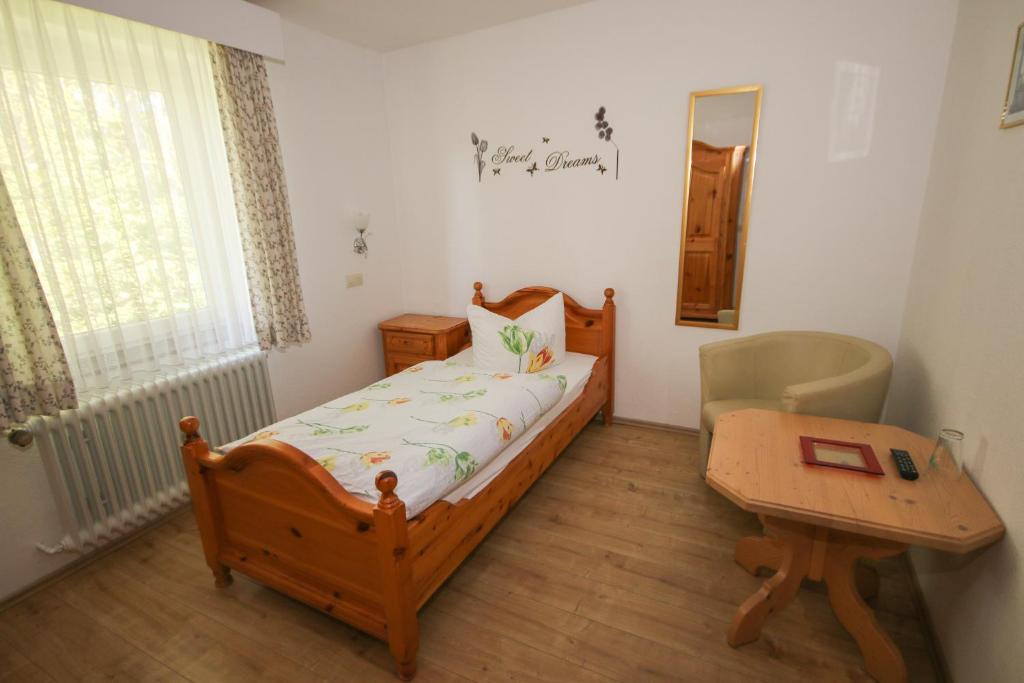 Postel nebo postele na pokoji v ubytování Hotel Charlott