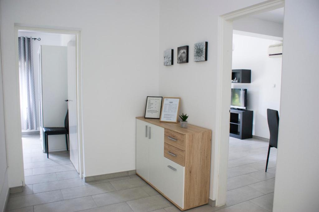Telewizja i/lub zestaw kina domowego w obiekcie Holiday home I.D.A.
