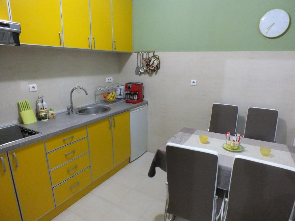 Kuchyň nebo kuchyňský kout v ubytování Apartment Temple