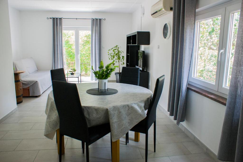 Telewizja i/lub zestaw kina domowego w obiekcie Holiday home I.D.A.