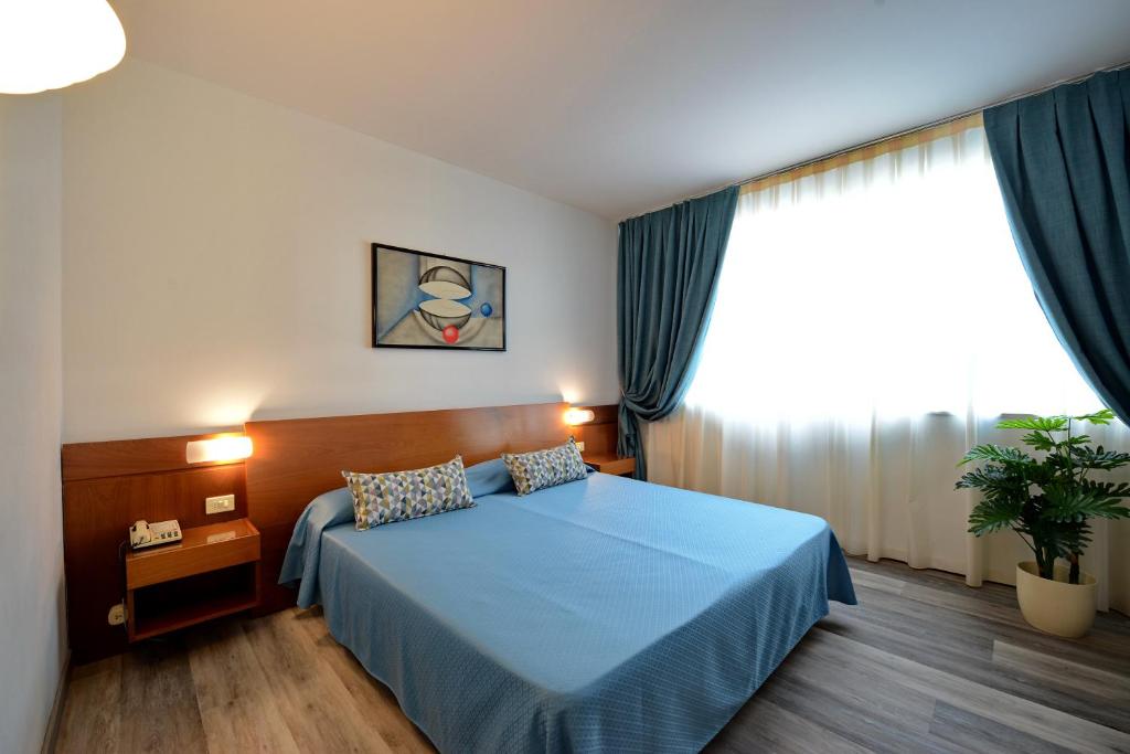 Postelja oz. postelje v sobi nastanitve Hotel Krystal