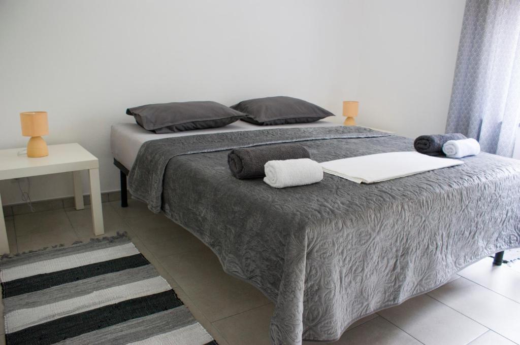 Łóżko lub łóżka w pokoju w obiekcie Holiday home I.D.A.