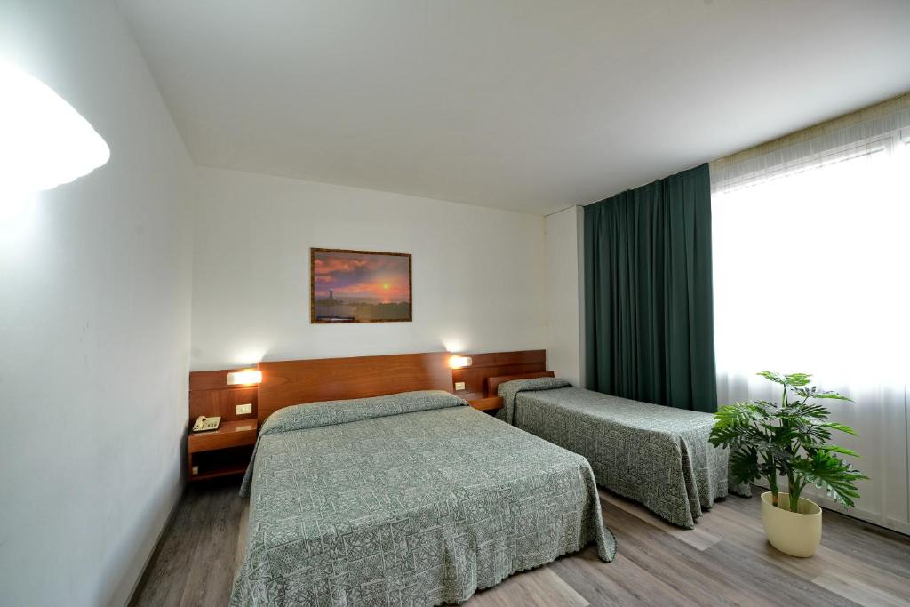 Postelja oz. postelje v sobi nastanitve Hotel Krystal