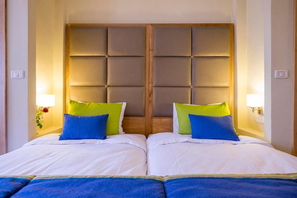 Postel nebo postele na pokoji v ubytování Hotel Bel Azur Thalasso & Bungalows