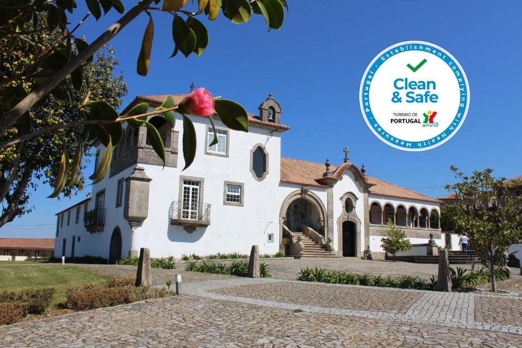a building with a sign that says clean safe at Boega Hotel in Vila Nova de Cerveira