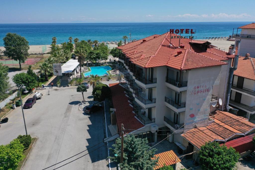an aerial view of a hotel and the beach at Hotel Afrodite in Nei Poroi