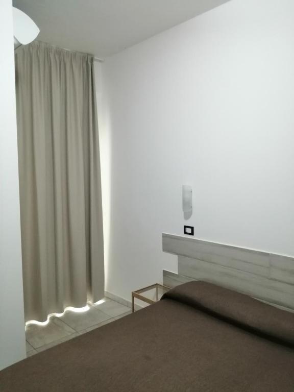 Postel nebo postele na pokoji v ubytování Hotel Brennero