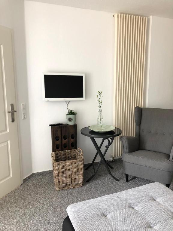 TV a/nebo společenská místnost v ubytování Apartment in Wiek