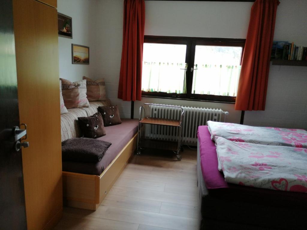 Postel nebo postele na pokoji v ubytování 2 Raum Ferienwohnung Sonnenschein
