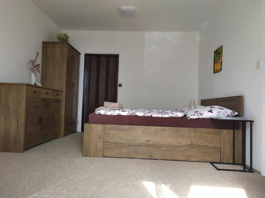 Postel nebo postele na pokoji v ubytování Apartmán Jan