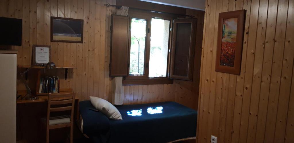Postel nebo postele na pokoji v ubytování Pozolico Hotel Rural