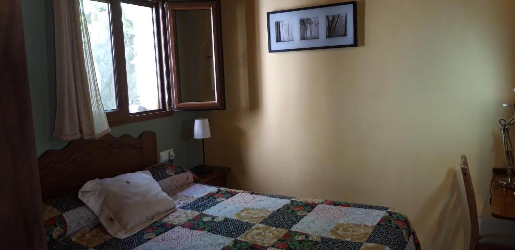 Postel nebo postele na pokoji v ubytování Pozolico Hotel Rural