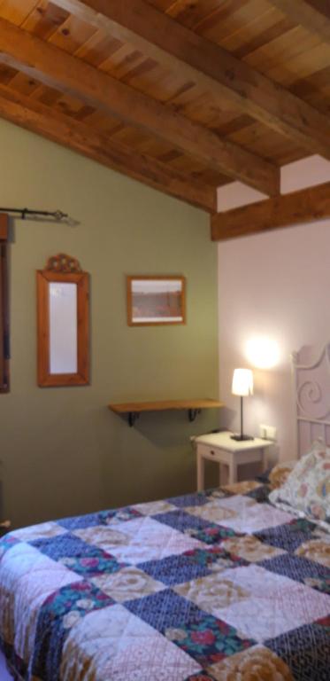 Postel nebo postele na pokoji v ubytování Pozolico Hotel Rural