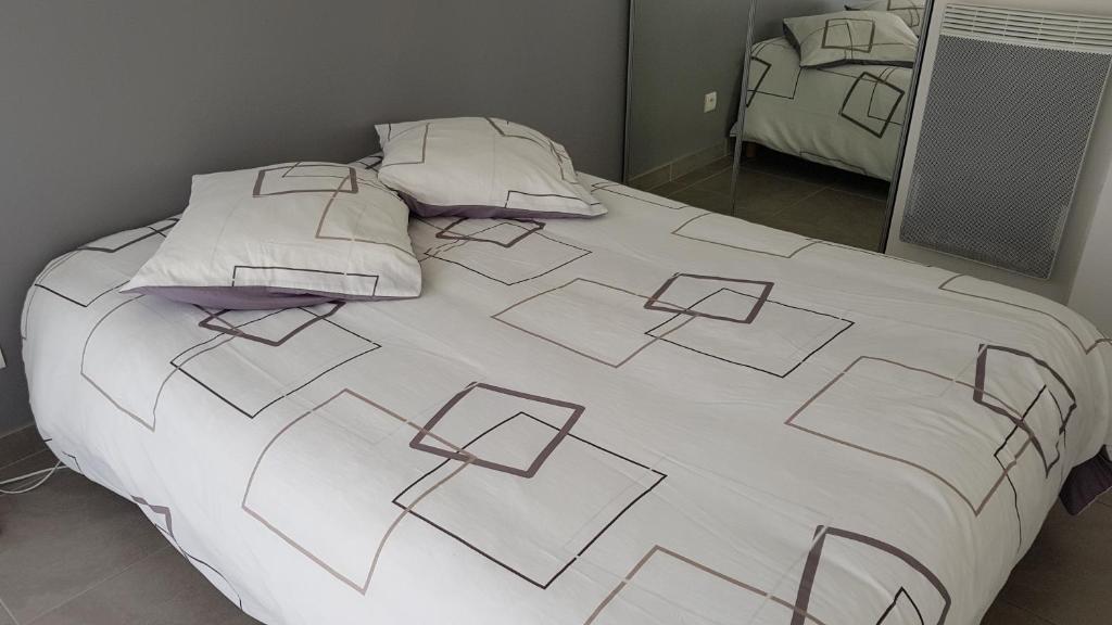 En eller flere senge i et v&aelig;relse p&aring; Beness&#39;Appart 5km Capbreton
