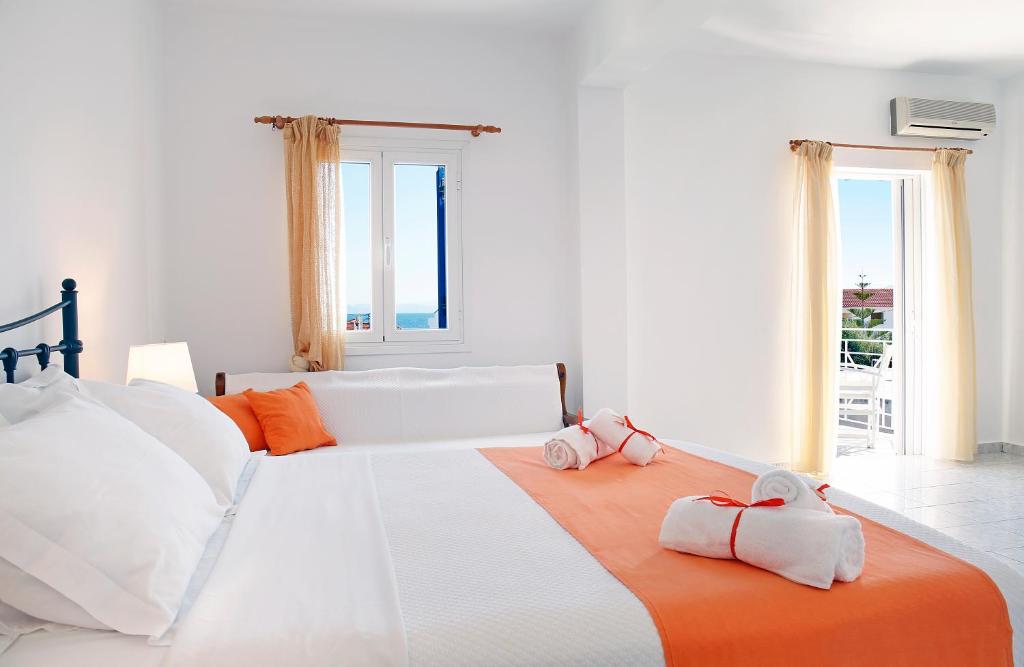 Postel nebo postele na pokoji v ubytování Agistri Apartments