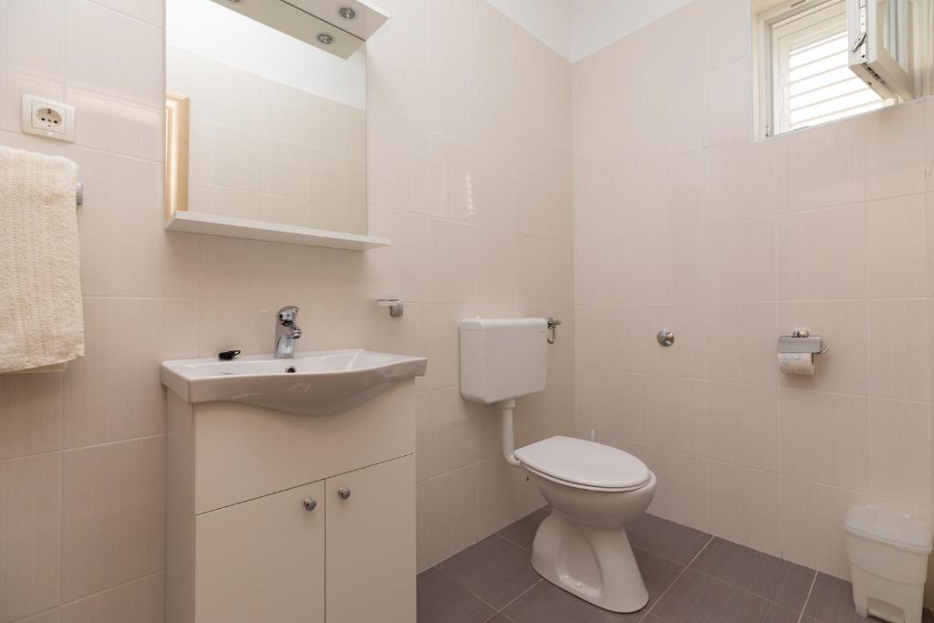 Koupelna v ubytování Apartmani Perak