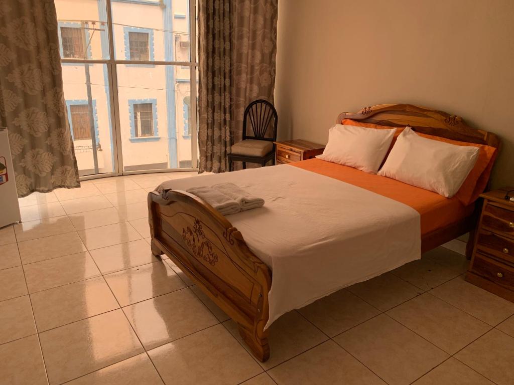 Postel nebo postele na pokoji v ubytování Residencial Turístico Rio Guayas