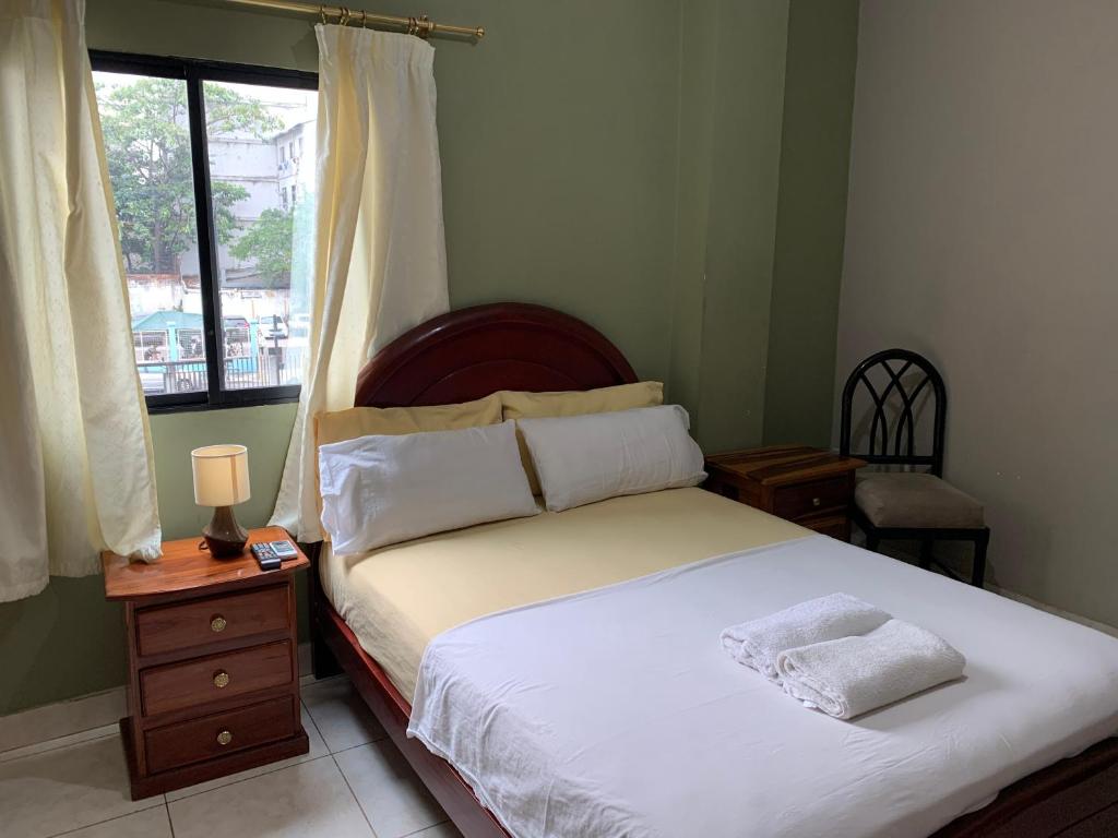 Postel nebo postele na pokoji v ubytování Residencial Turístico Rio Guayas
