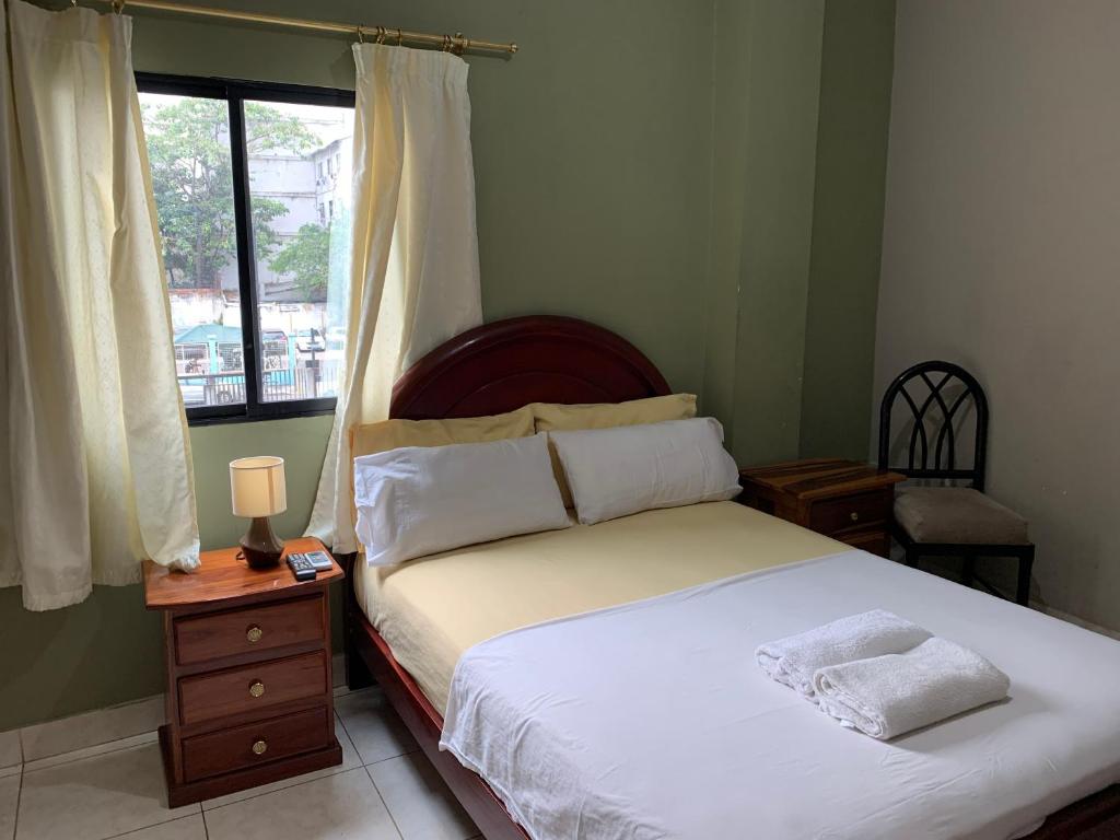 Postel nebo postele na pokoji v ubytování Residencial Turístico Rio Guayas