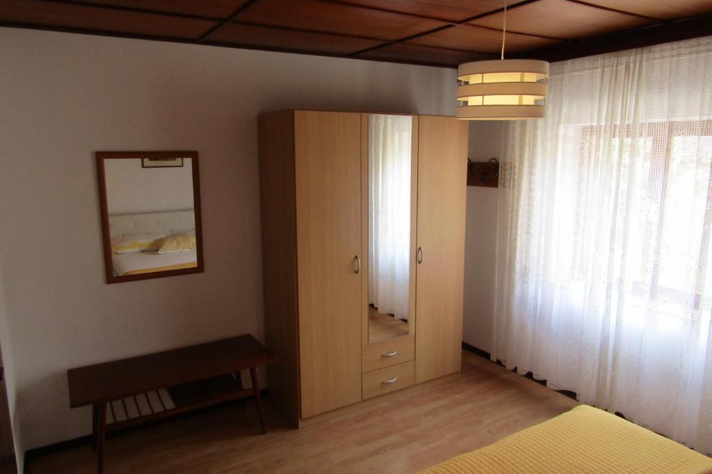 Posteľ alebo postele v izbe v ubytovaní Apartman Avsec