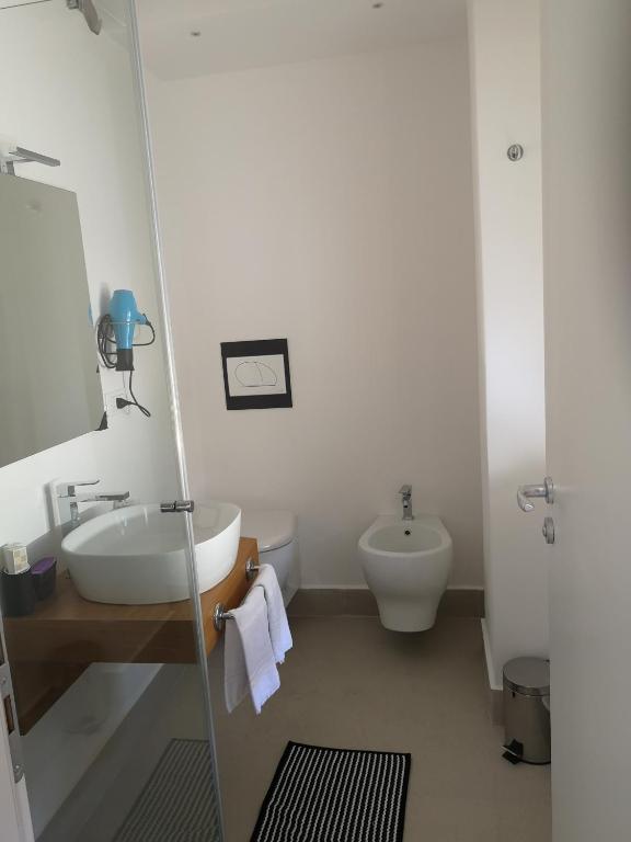 A bathroom at Athena Charming Rooms