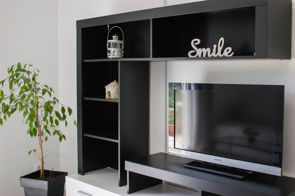 Telewizja i/lub zestaw kina domowego w obiekcie Holiday home I.D.A.