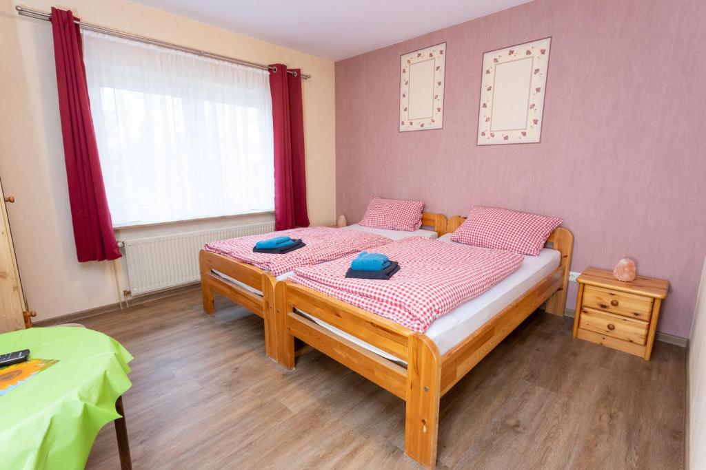 Postel nebo postele na pokoji v ubytování Rhododendronhof
