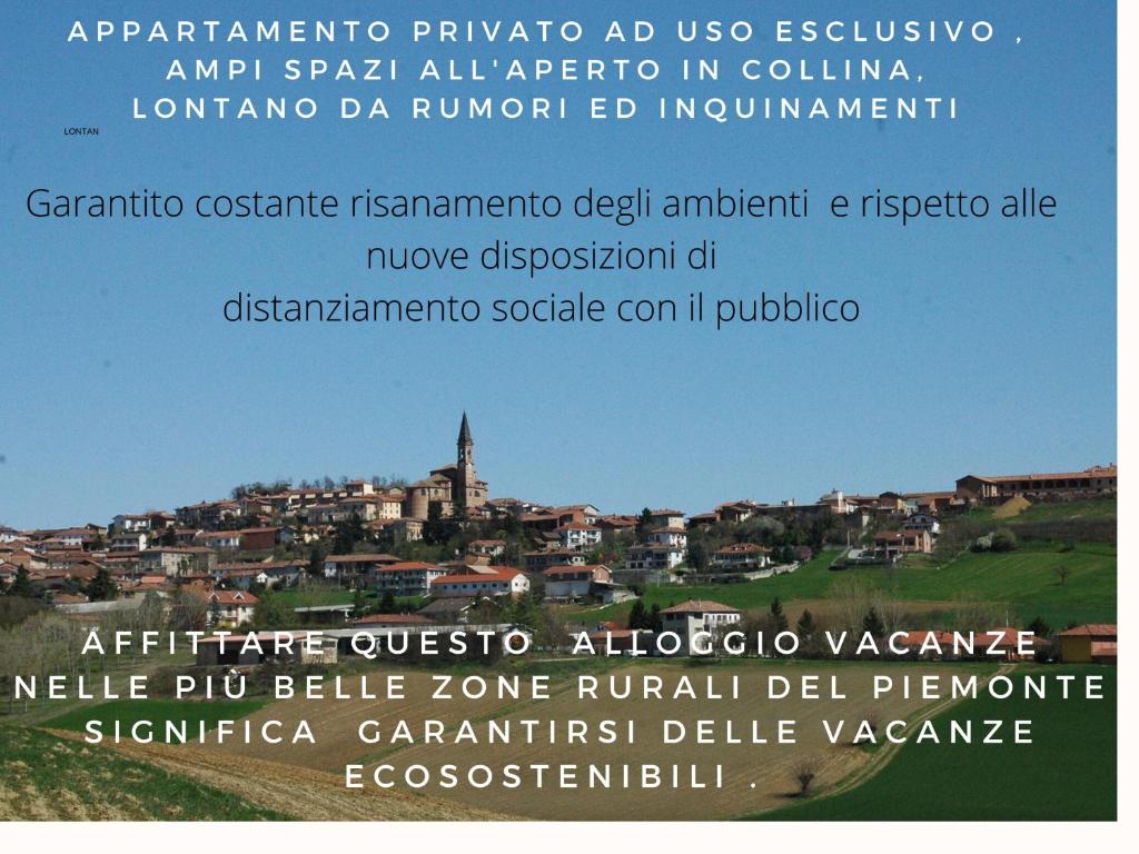 ToncoにあるAlloggio Vacanze Monferrato Le Ginestreの丘の上の都市のポスター
