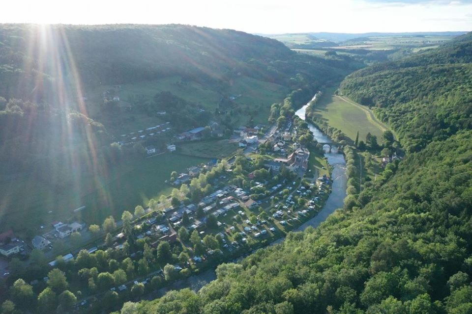 an aerial view of a village and a river at Camping Wies-Neu in Dillingen