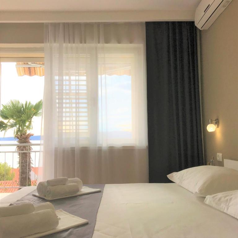 Postel nebo postele na pokoji v ubytování Berulia accommodation