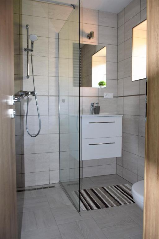 Koupelna v ubytování ADEMI Apartments