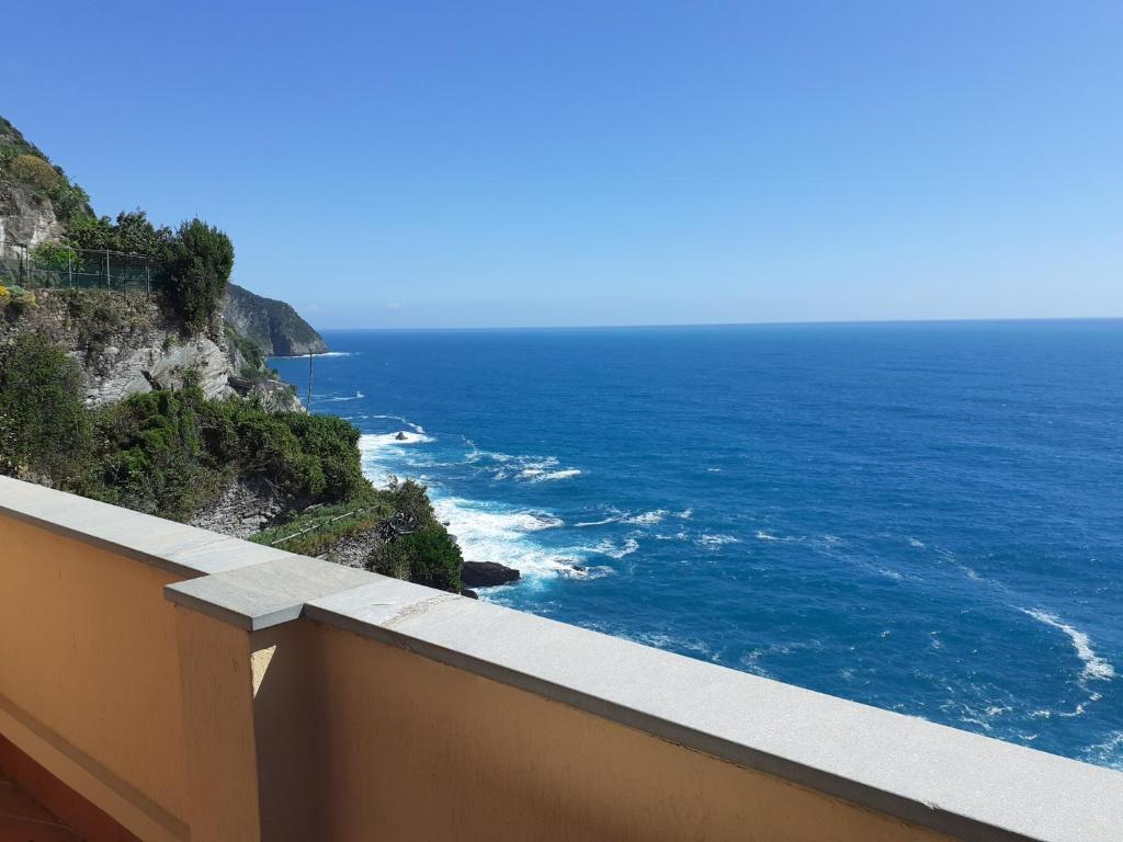 a view of the ocean from a balcony at Raggio di Luna in Manarola