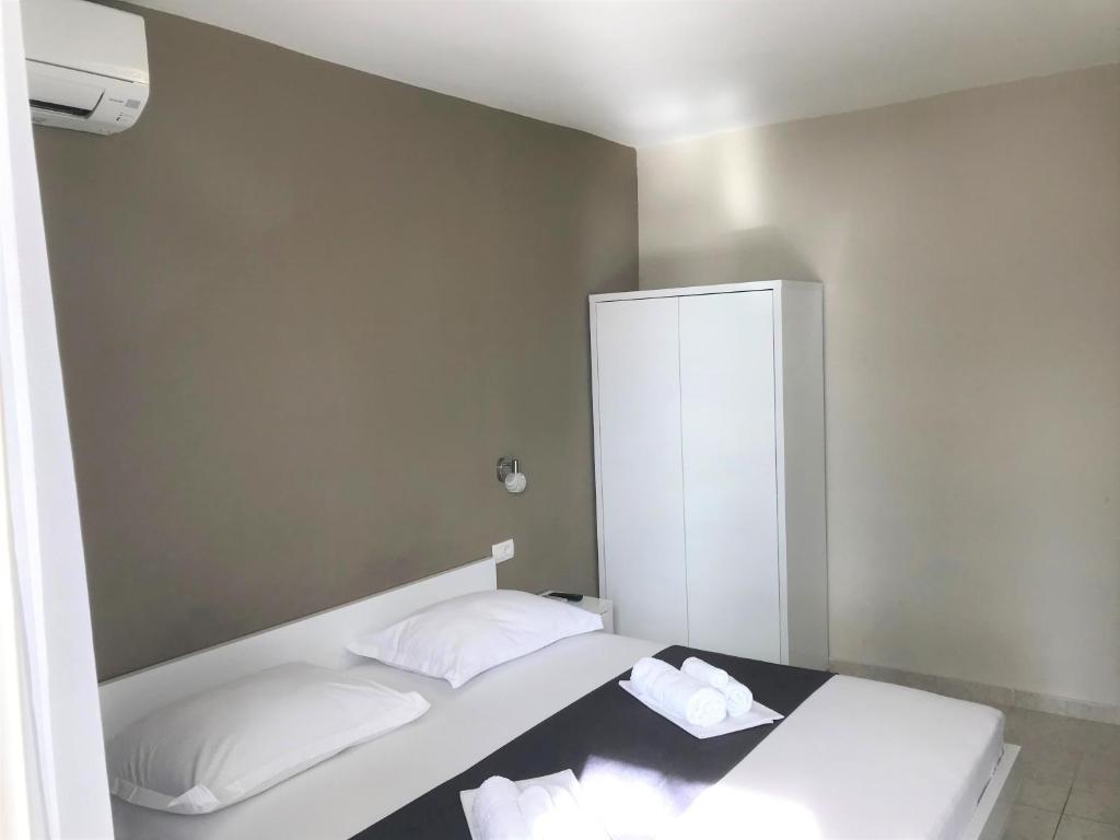 Postel nebo postele na pokoji v ubytování Berulia accommodation