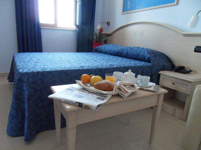 Postel nebo postele na pokoji v ubytování Hotel Belvedere