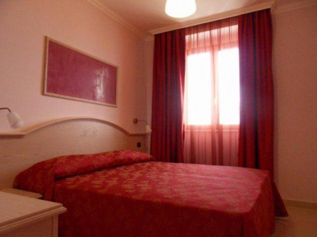 Postel nebo postele na pokoji v ubytování Hotel Belvedere
