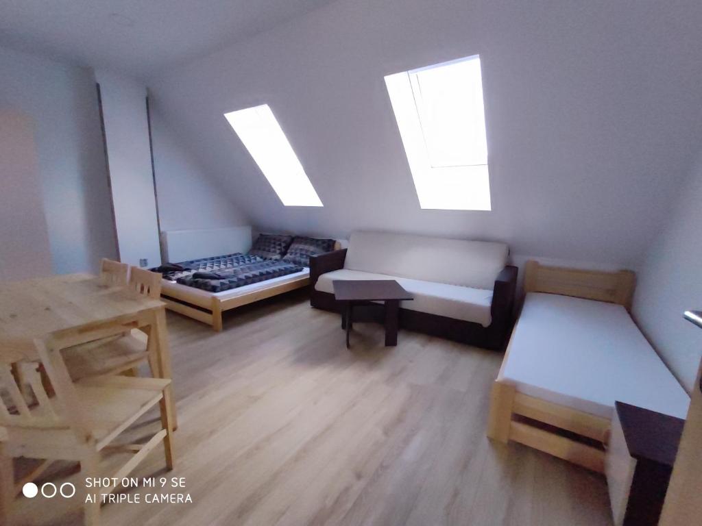 Postel nebo postele na pokoji v ubytování Apartmány Opolany